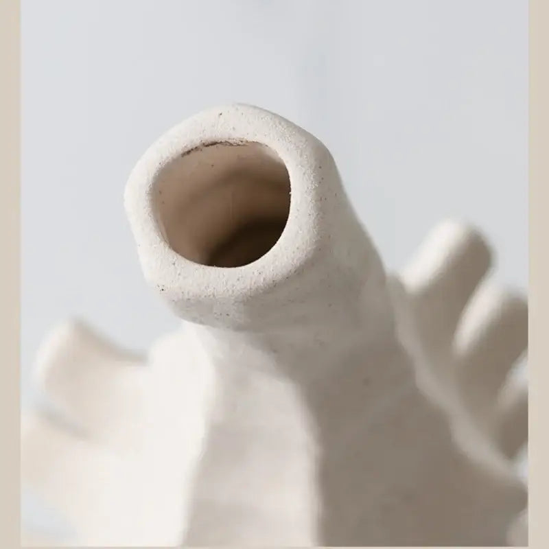 Textured off-white decorbites ceramic vase with wide open top and organic branching design for home decor