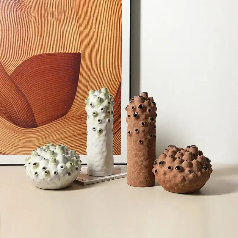 Decorbites coral ball ceramic vases in terra-cotta and white with textured black openings for living room decor