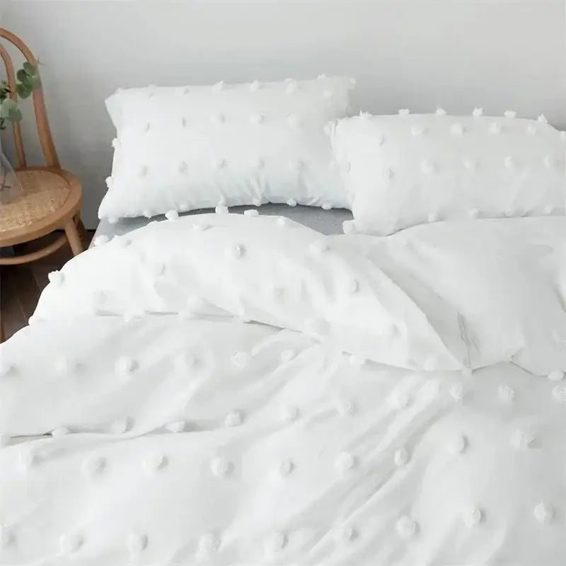 Textured white pom pom quilt cover set featuring soft fluffy pom poms for cozy bedroom bedding use
