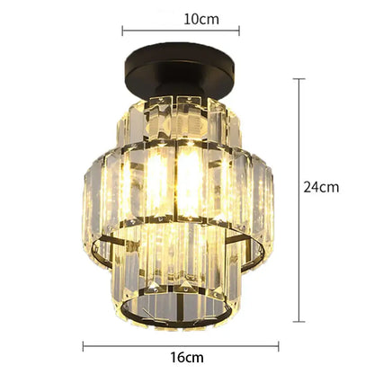 A tiered decorbites black gold minimalist led chandelier with black metal frame and cascading clear glass prisms