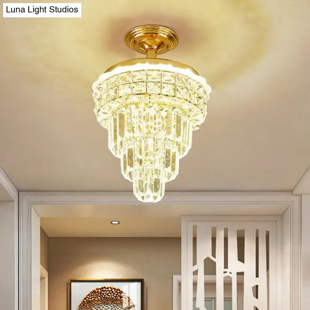 Tiered gold ceiling-mounted chandelier with clear faceted optical crystal prisms for elegant foyer decorbites optical crystal