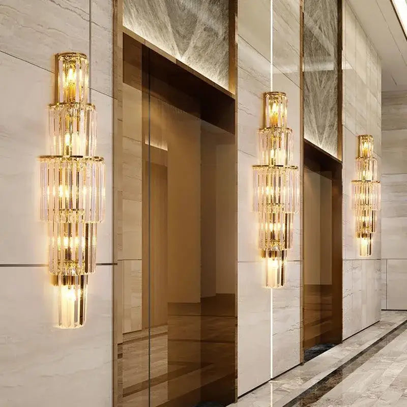 Tiered gold crystal wall lamp with cascading crystal tiers for elegant living room decorbites crystal wall sconce