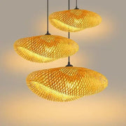 Tiered golden lattice decorbites bamboo chandelier features three woven pendant lights for elegant dining room lighting