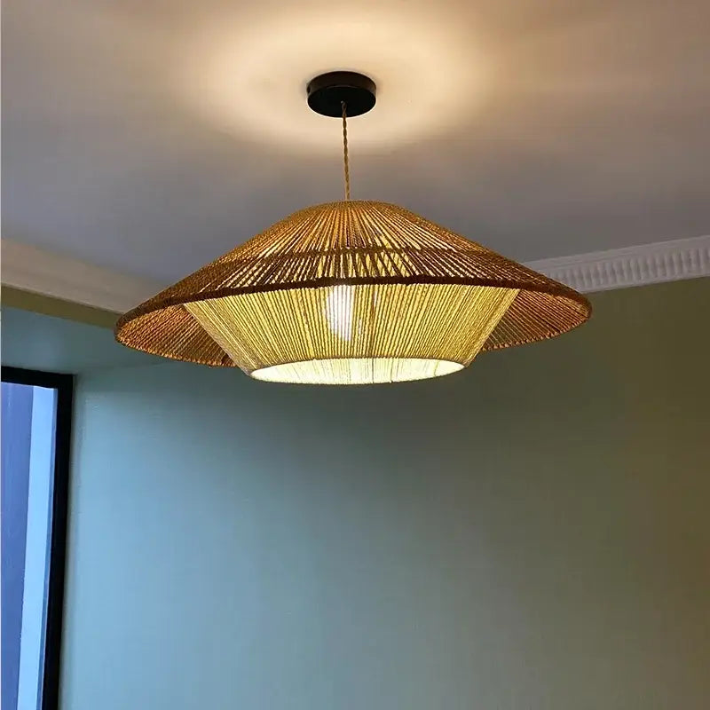 A warm-toned woven bamboo tiered pendant light with hemp rope rattan weave for dining room decorbites lighting