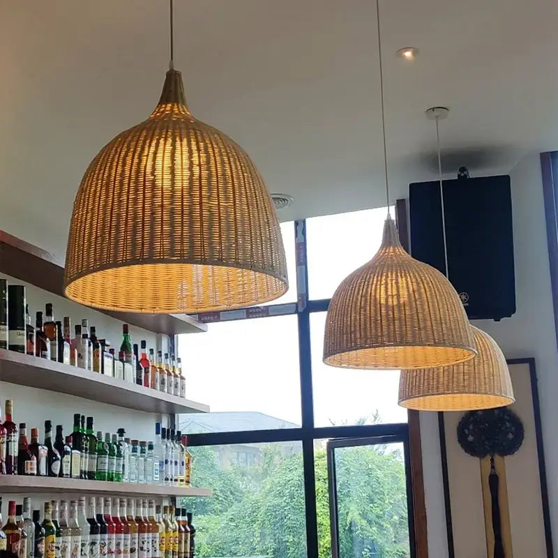 Tiered natural bamboo weaving led pendant lights with a warm golden glow for dining room illumination