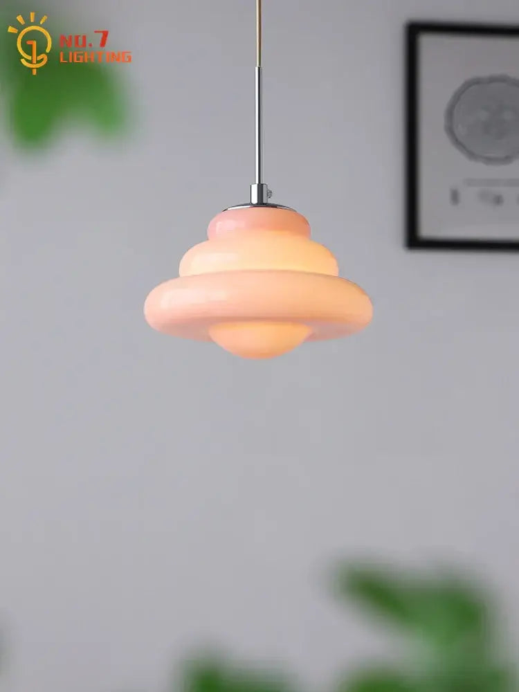 Pastel peach layered decorbites cream glass pendant lights with sleek chrome stem for kitchen lighting