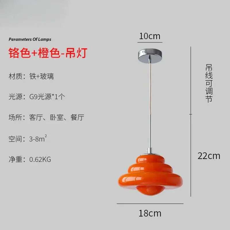 A vibrant orange tiered decorbites cream glass pendant light with chrome mount and adjustable cord for kitchen use