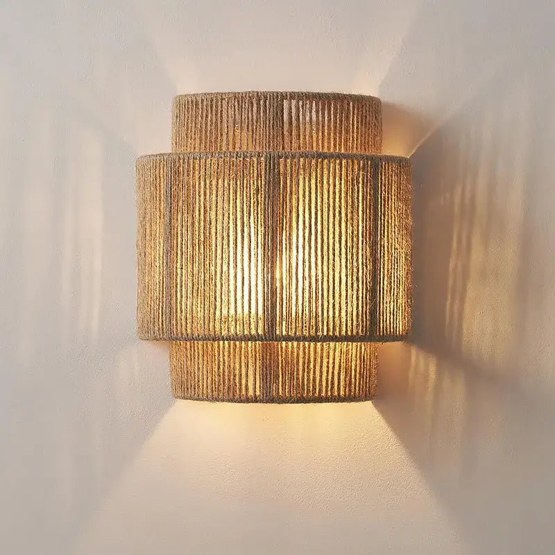 Warm-toned tiered wall lamp crafted from woven hemp rope with a rustic finish for bedroom and living room decorbites hemp rope