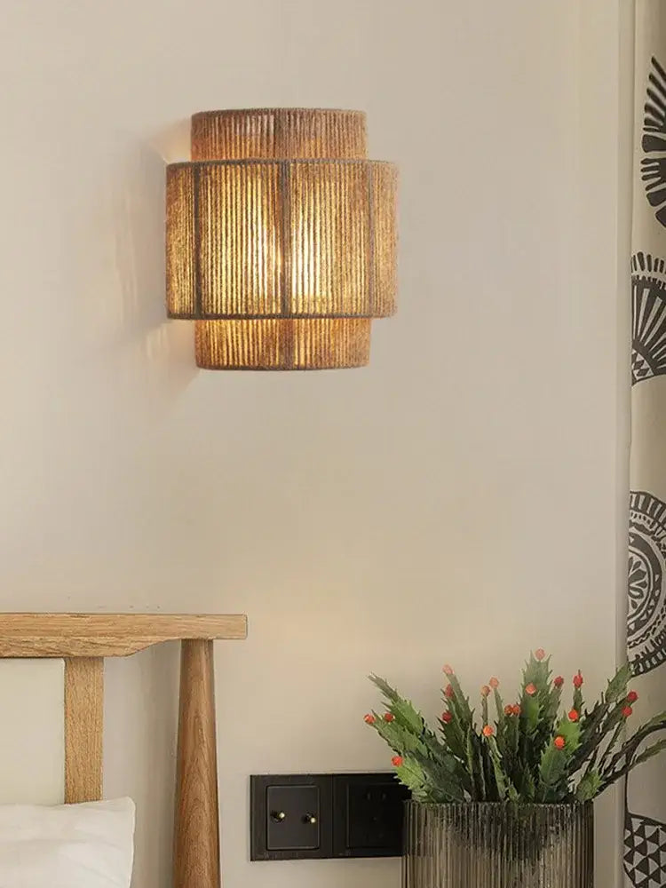 Warm-toned tiered rattan hemp rope wall lamp with woven finish for bedroom and living room decorbites hemp rope wall decor