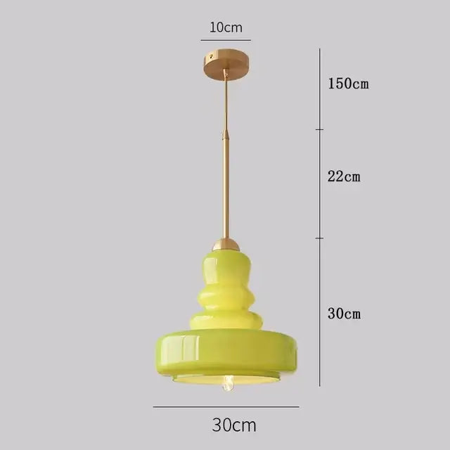 A modern tiered lime green glass pendant light with brass accents and slender stem for pendant lights ceiling use
