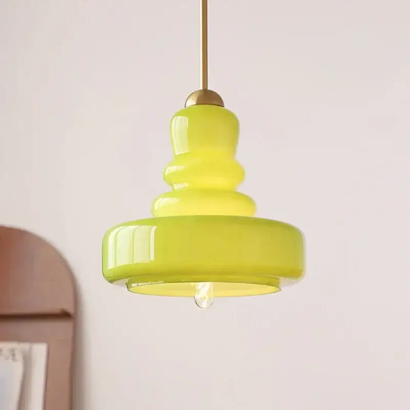 Vibrant lime green glass pendant lights with stacked tiered design and brass finished rod for pendant lights ceiling use