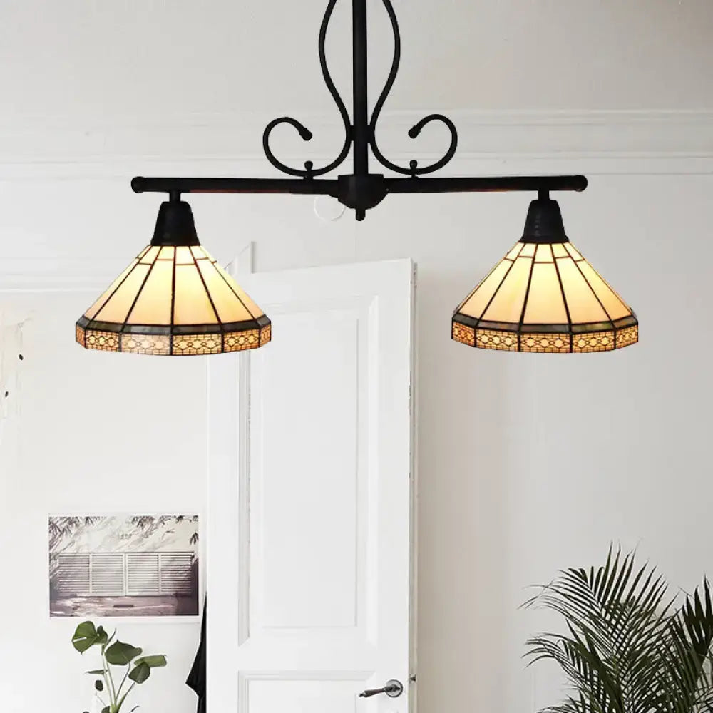 Black wrought iron DecorBites™ ceiling light with two amber glass cone shades featuring geometric floral patterns