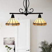 Black wrought iron DecorBites™ ceiling light with two amber glass cone shades featuring geometric floral patterns