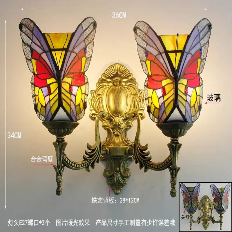 Golden ornate brass wall lamps with vibrant yellow red and purple decorbites butterfly glass sconces for bedroom use