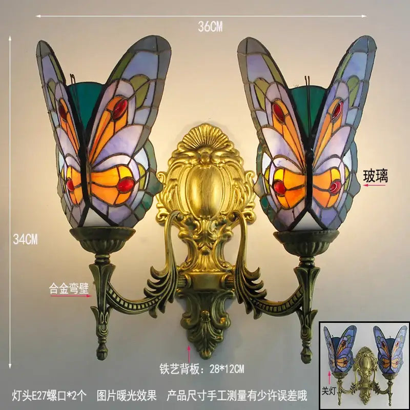 Ornate gold-toned butterfly glass sconces with iridescent blue orange and green shades for bedroom wall lamps decorbites butterfly glass