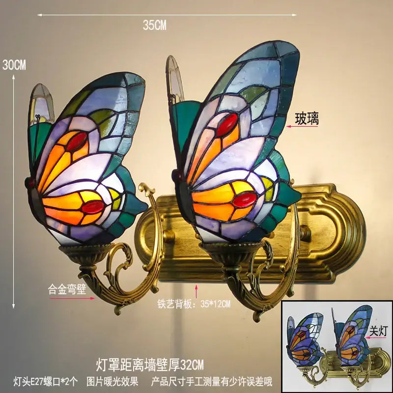 Tiffany butterfly glass sconces wall lamps with vibrant stained glass butterfly in blue green orange and red set in brass frame
