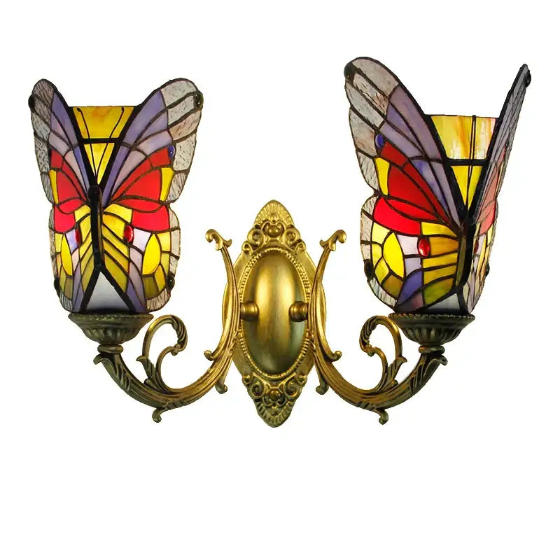 Vibrant butterfly glass sconces with stained glass and gold-toned ornate brass wall lamps for bedroom decorbites decor