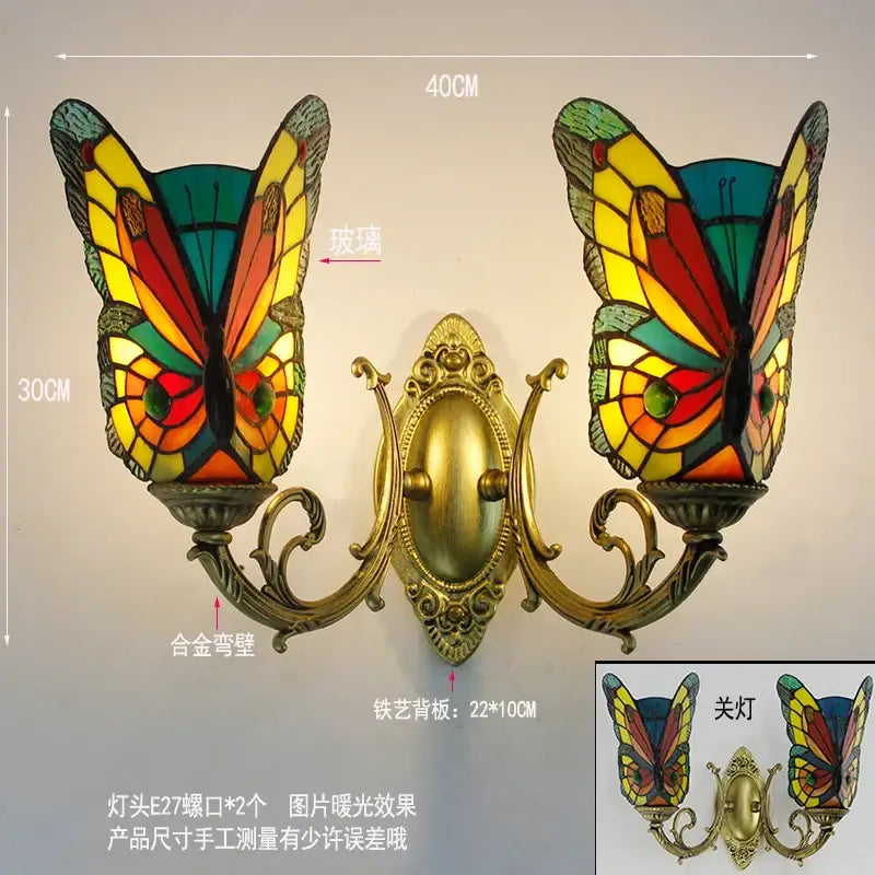 Vibrant butterfly glass sconces with gold-toned brass arms and backplate wall lamps for bedroom decorbites butterfly glass