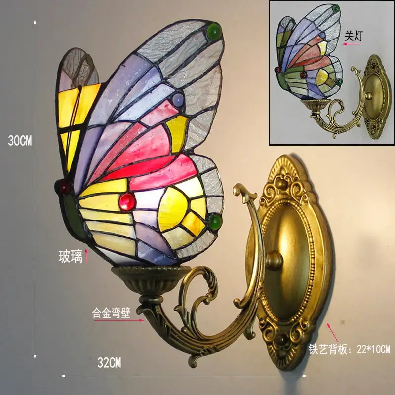 A vibrant butterfly glass sconce with colorful wings and brass bracket wall lamp for bedroom decorbites butterfly glass