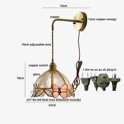 Copper-finished wall lamp with stained glass tiffany butterfly glass shade featuring pink and clear butterfly motifs