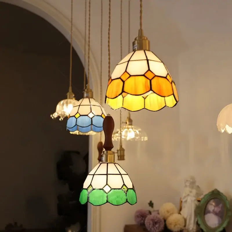Tiffany green and cream stained glass led pendant lamp with hexagonal panels in warm yellow, cool blue, and vibrant green hues