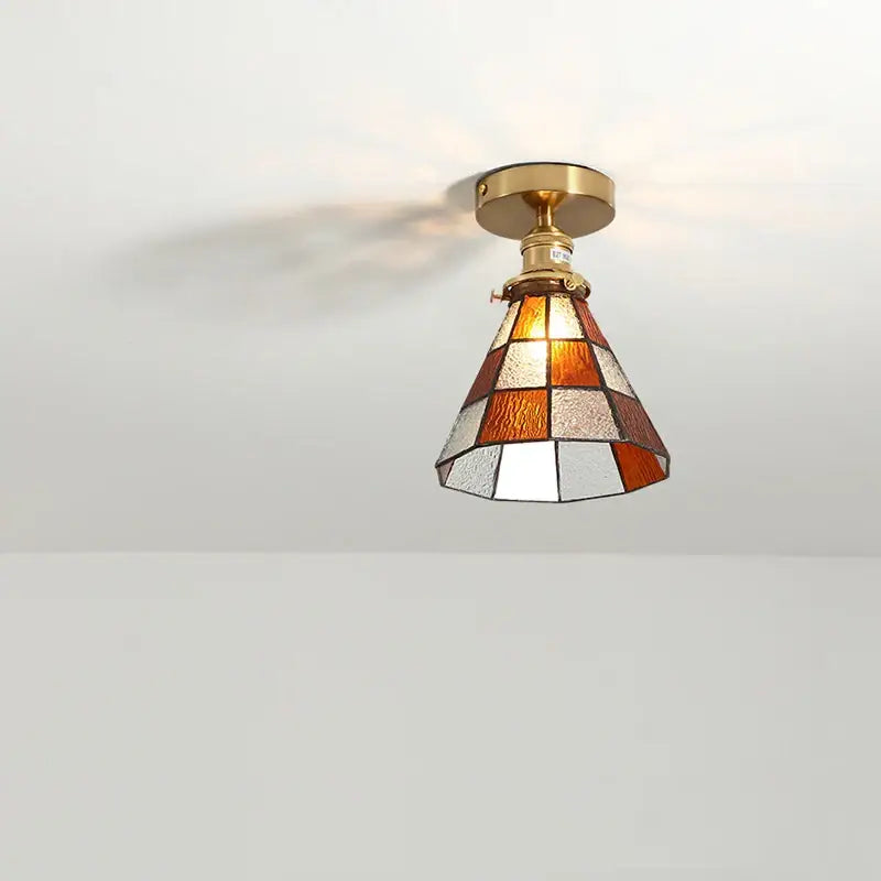 A vintage-style amber and white stained glass led ceiling light with brass fixture for living room ceiling lights