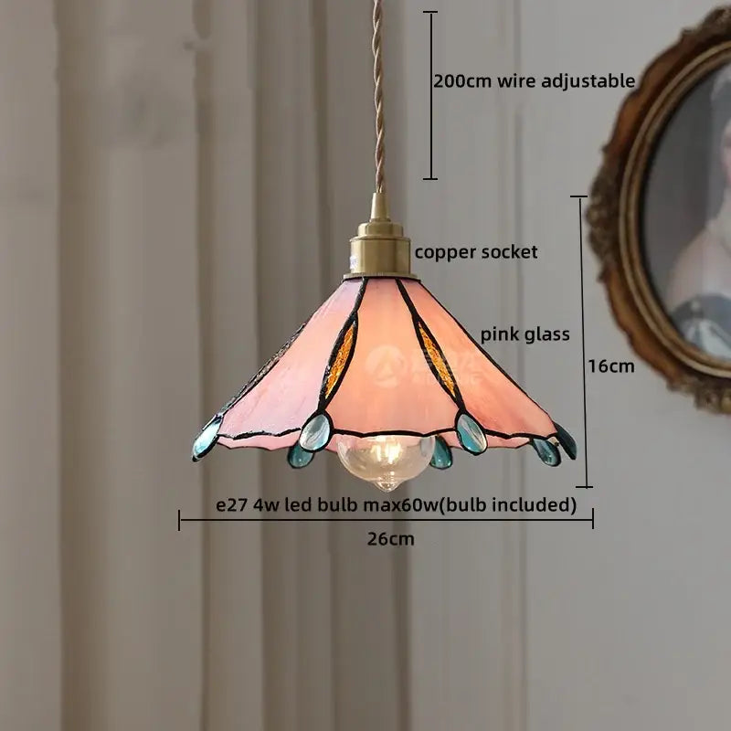 A delicate pink tiffany stained glass copper led pendant lamp with teal teardrop accents for dining room lighting