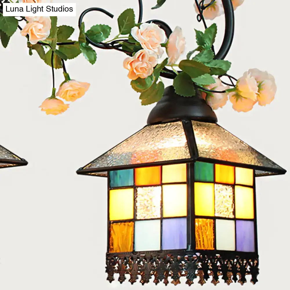 Decorbites tiffany style island light fixture with colorful stained glass panels and black wrought iron frame for balcony use