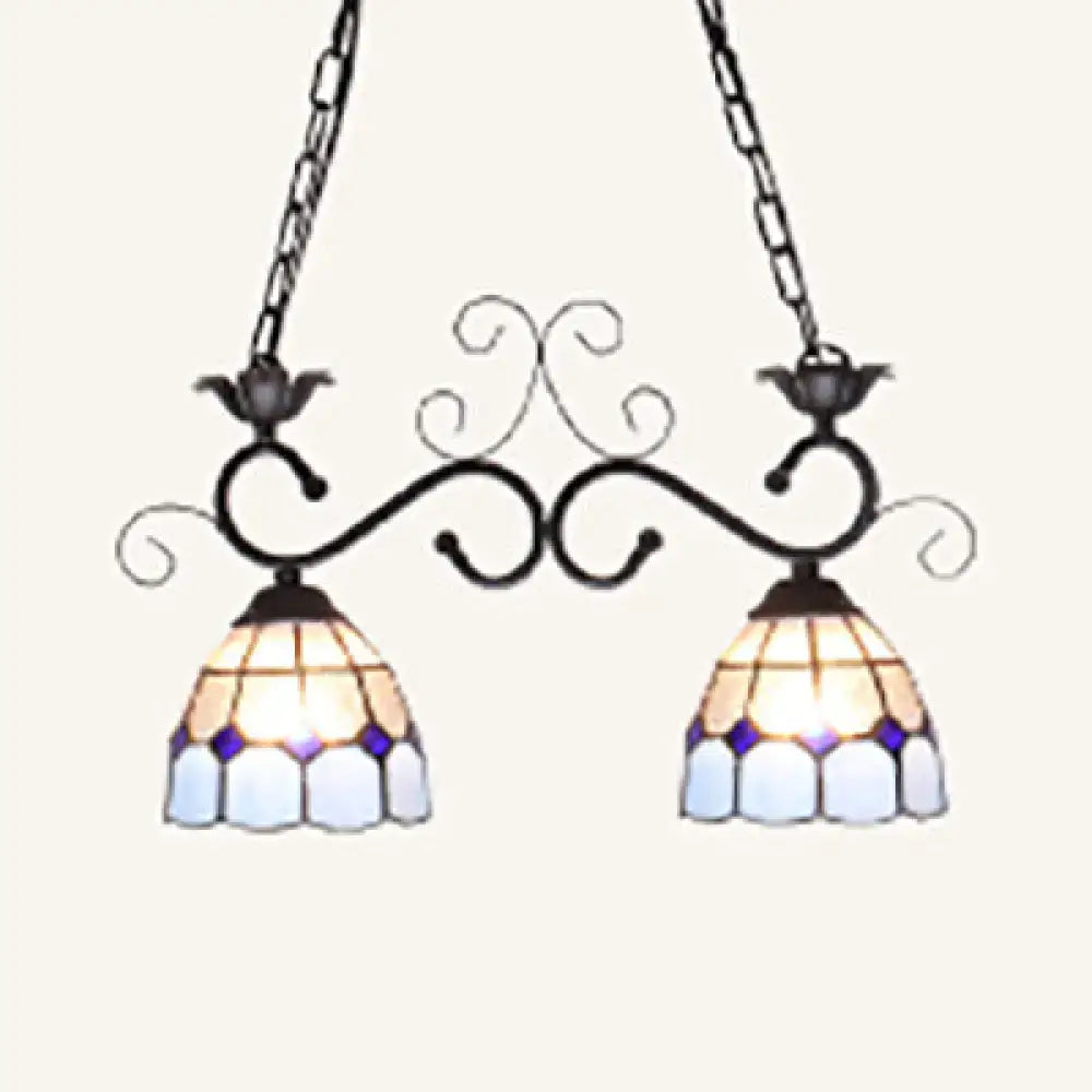 Vintage-style tiffany style double pendant light with black wrought iron arms and blue white stained glass shades ideal for balcony