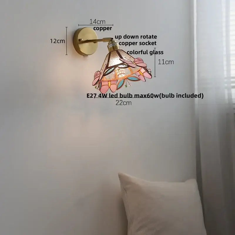 A decorative copper wall sconce with colorful square glass stained shade featuring pink and blue floral patterns for wall lights decorbites colorful square