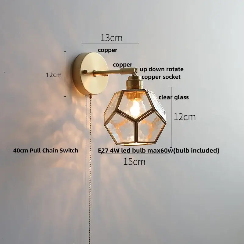A brass-finished geometric wall sconce with clear glass shade and copper hardware for decorbites colorful square wall lights