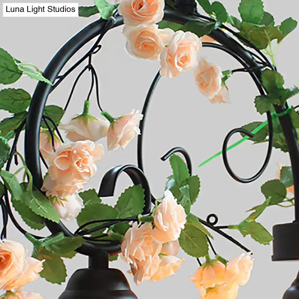 Decorbites yellow bell shade island pendant light featuring black wrought iron chandelier with peach roses and art glass