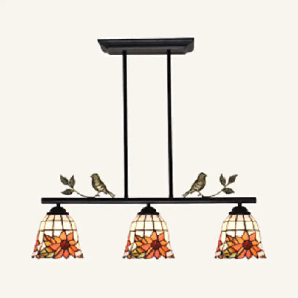 Black antique brass chandelier with three stained glass sunflower shades and bird accents in tiffany style design