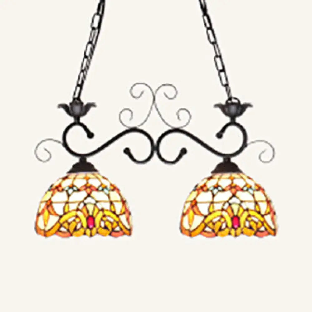 Decorbites stainless glass pendant light with black wrought iron arms and stained glass shades in sunflower pattern
