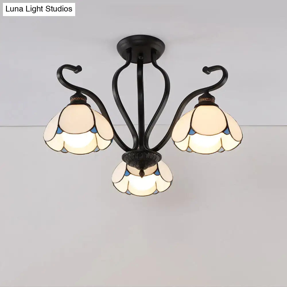 Black wrought iron DecorBites™ semi-flush mount chandelier with three cream and blue stained glass flower shades for living room lighting
