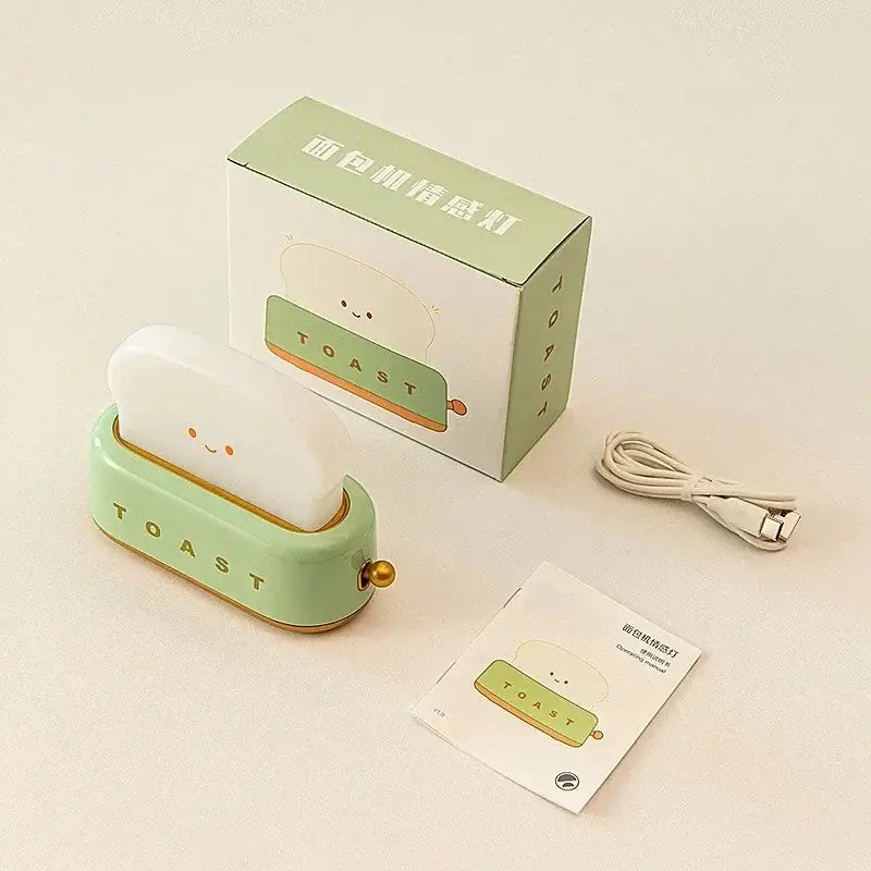 Mint green toaster shaped maker night light with smiling bread slice and gold accents usb lamp for bedroom use