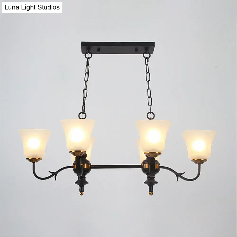 Traditional black wrought iron pendant ceiling lamp with brass accents and white glass shades for dining room lighting
