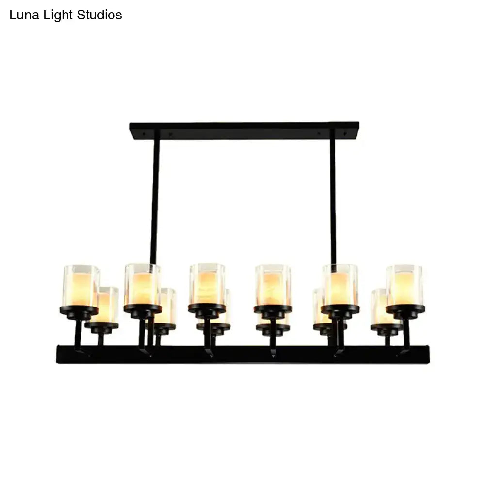 Black metal chandelier with ten clear glass candle-style shades in traditional black cylinder design for dining room lighting
