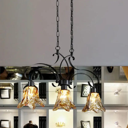 DecorBites™ traditional black island lamp with amber glass floral design and three down lighting pendants for dining room