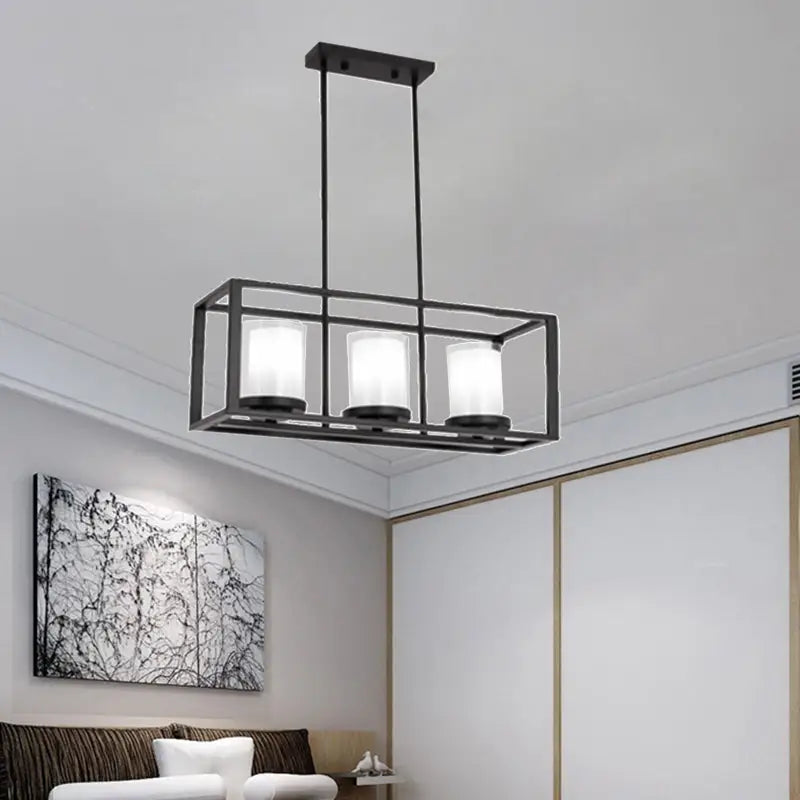 Black metal rectangle frame pendant light with three frosted glass cylinders for dining room lighting