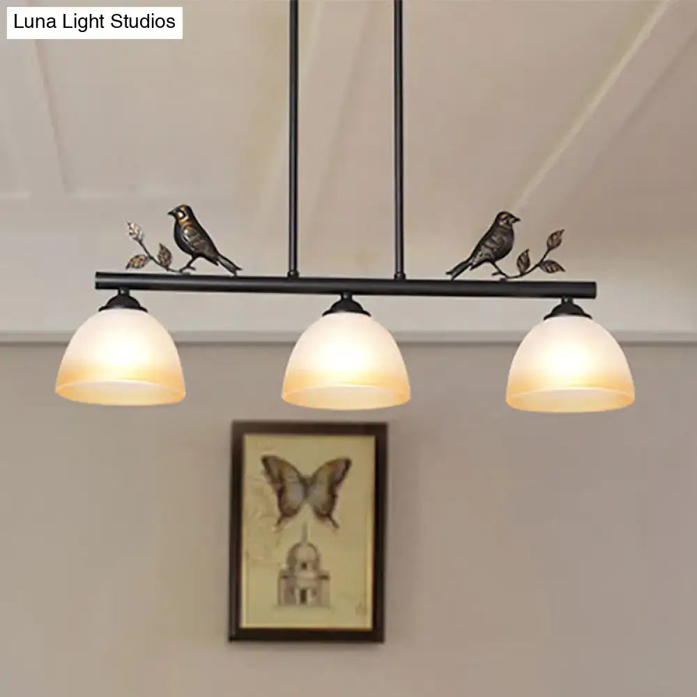 DecorBites™ traditional black metal ceiling light with three white glass shades and decorative bird figures on branch