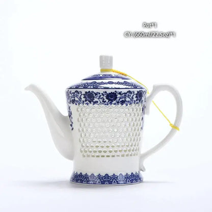 White ceramic tea pot with perforated body and blue white porcelain floral and geometric patterns by decorbites blue white
