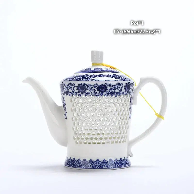White ceramic tea pot with perforated body and blue white porcelain floral and geometric patterns by decorbites blue white