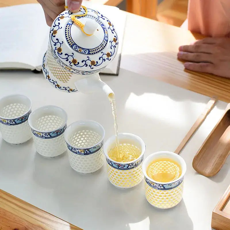 White porcelain tea set with blue white porcelain perforated body and gold floral patterns for decorbites blue white dining room