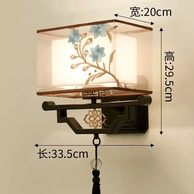Traditional bronze floral elegant fabric wall lamp with illuminated embroidered blue flowers and gold vines for bedroom lighting