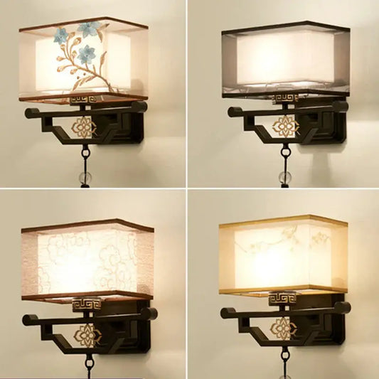 Traditional bronze floral elegant fabric wall lamp with dark bronze frame and embroidered beige and blue shade for bedroom lighting