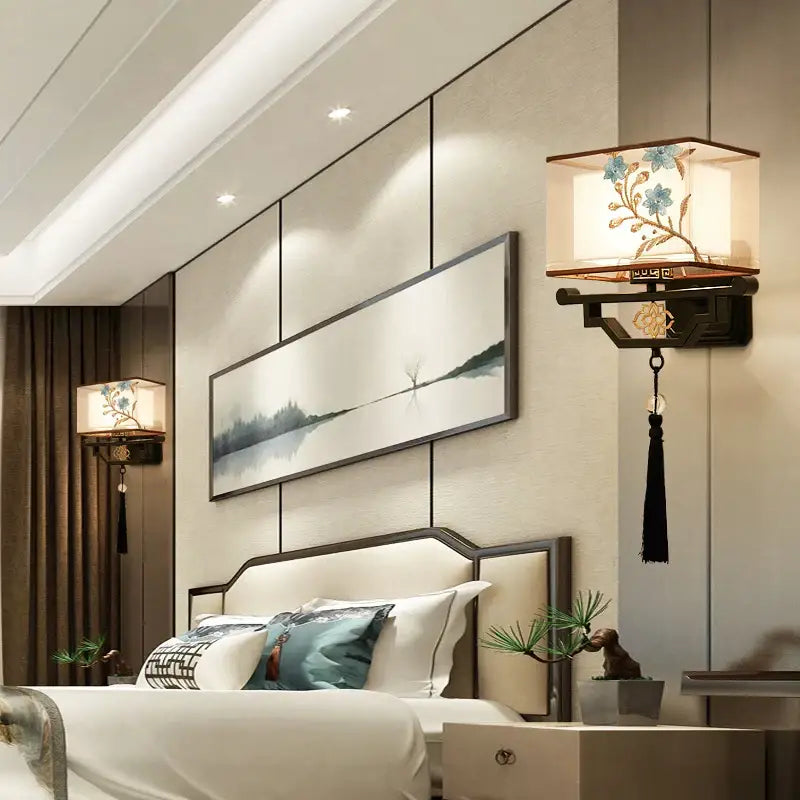 Traditional bronze floral elegant fabric wall lamp with embroidered blue floral paper shade and dark wood frame for bedroom lighting