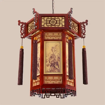 Red wooden traditional chinese carved bamboo lantern pendant light with intricate lattice work and hanging tassels for dining room