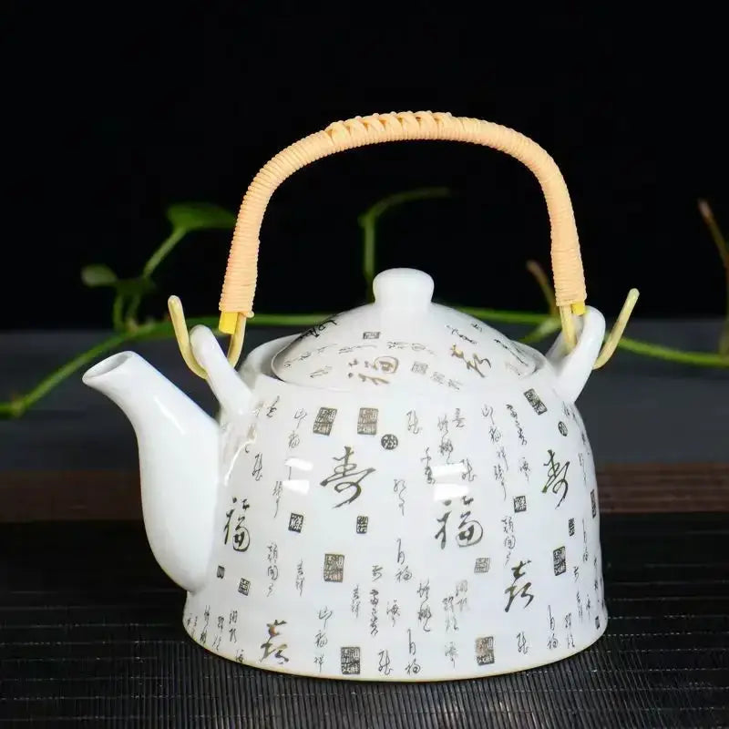 Traditional chinese white porcelain tea pot with gold calligraphy and woven bamboo handle for dining room decor
