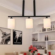 Decorbites frosted glass black island pendant light kit with three cylindrical white frosted glass shades for dining room